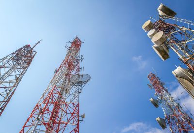 cellular communication towers on blue sky